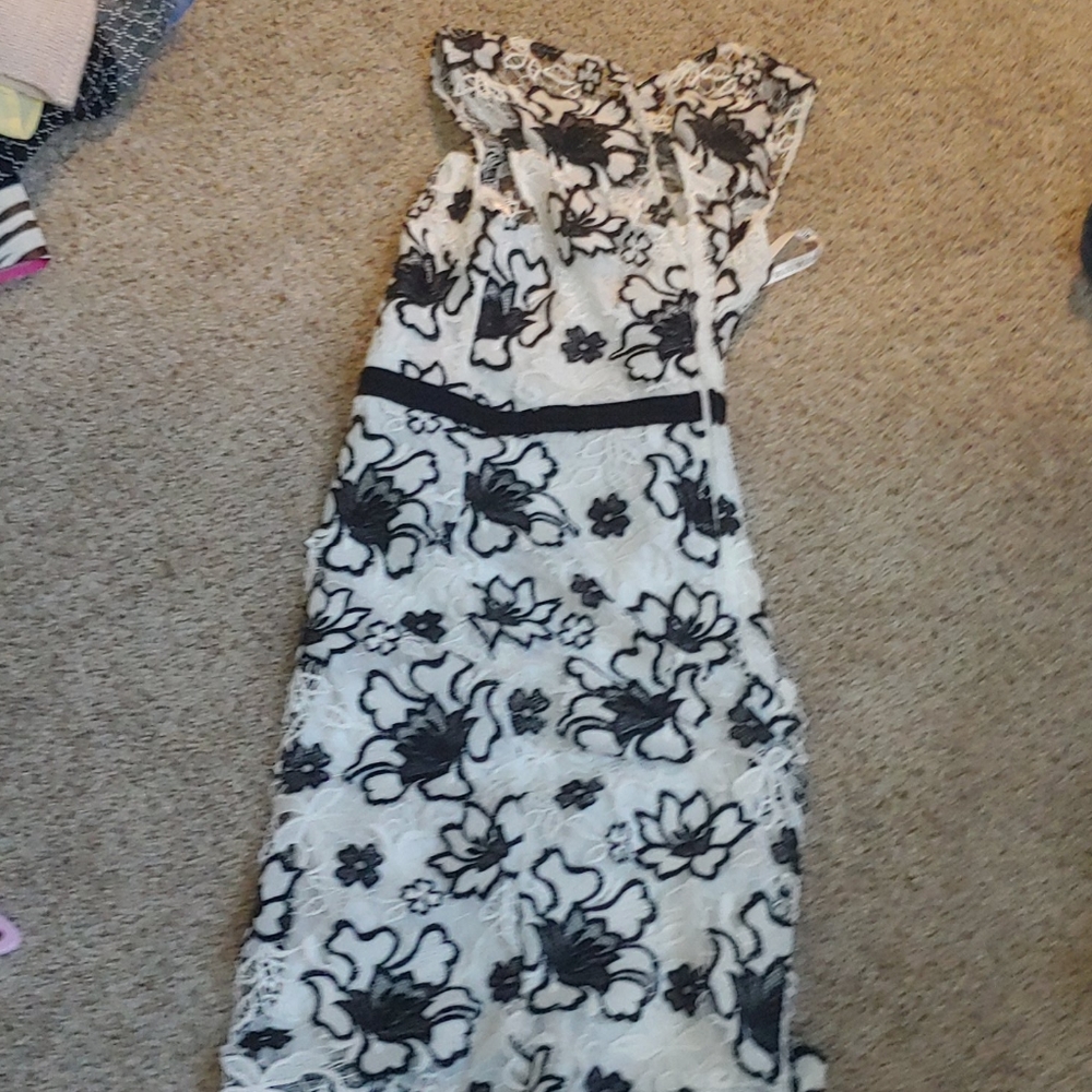 A long black and white lace dress